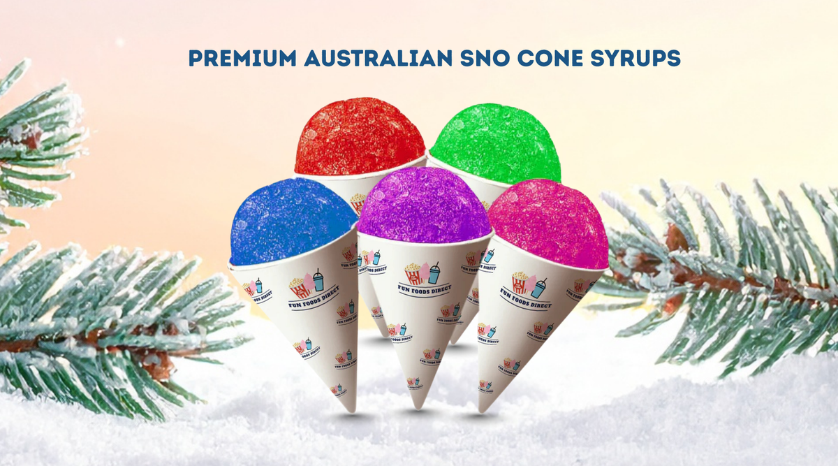 Colorful premium snow cones made with snow cone syrups australia displayed in snowy winter setting with evergreen branches