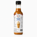 Caramel Dessert Topping in a bottle, ideal for thickshakes, sundaes, and drinks, featuring easy-to-use syrup.
