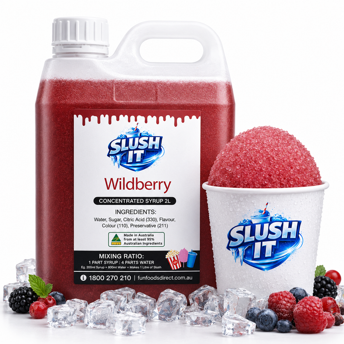 Wildberry snow cone syrup 2L bottle next to a cup of wildberry slush topped with ice and berries.
