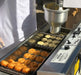 Classic Cake Donut Mix | World’s Best Tasting Donut Mix being used in a professional donut fryer.