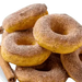 Classic Cake Donut Mix | World’s Best Tasting Donut Mix - freshly made cinnamon donuts piled high.