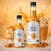 Salted Caramel Dessert Topping in two bottles with ice cream and drinks, perfect for milkshakes and sundaes.