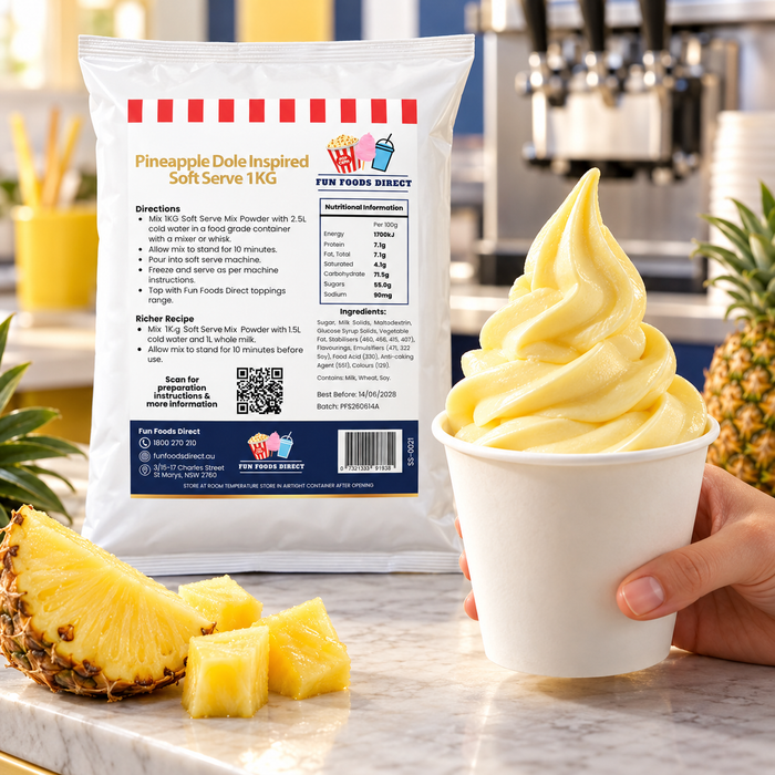 Hand holding pineapple soft serve beside the Pineapple Dole Inspired Soft Serve Mix 1kg pouch