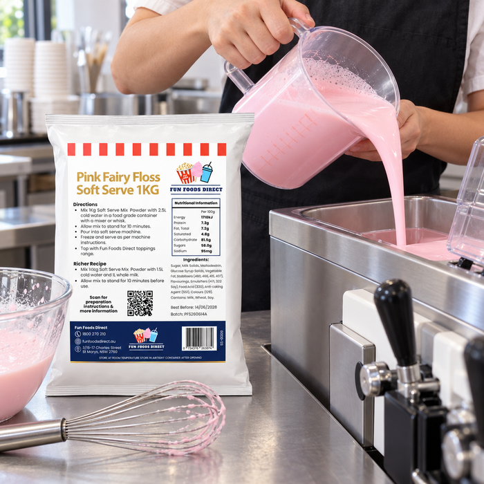 Pink Fairy Floss Soft Serve 1kg bag beside mix being poured into a soft serve machine