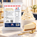 Cheesecake Soft Serve 1kg bag with soft serve dessert and flavour ingredients in a café setting
