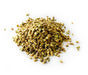 raw crushed pistachios bulk piled on white background, vibrant green crunchy pistachio pieces for baking and dessert toppings